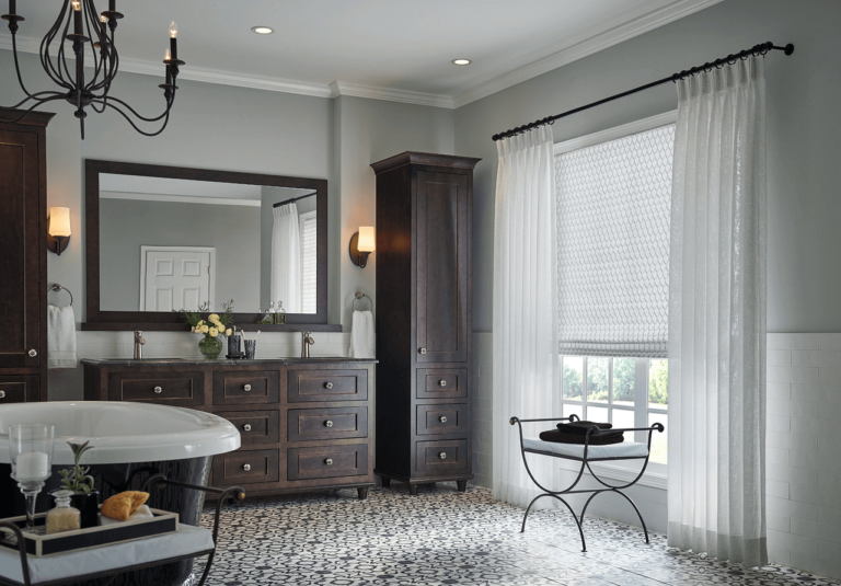 upscale bathroom with sheer drapes installed on a large window san antonio tx